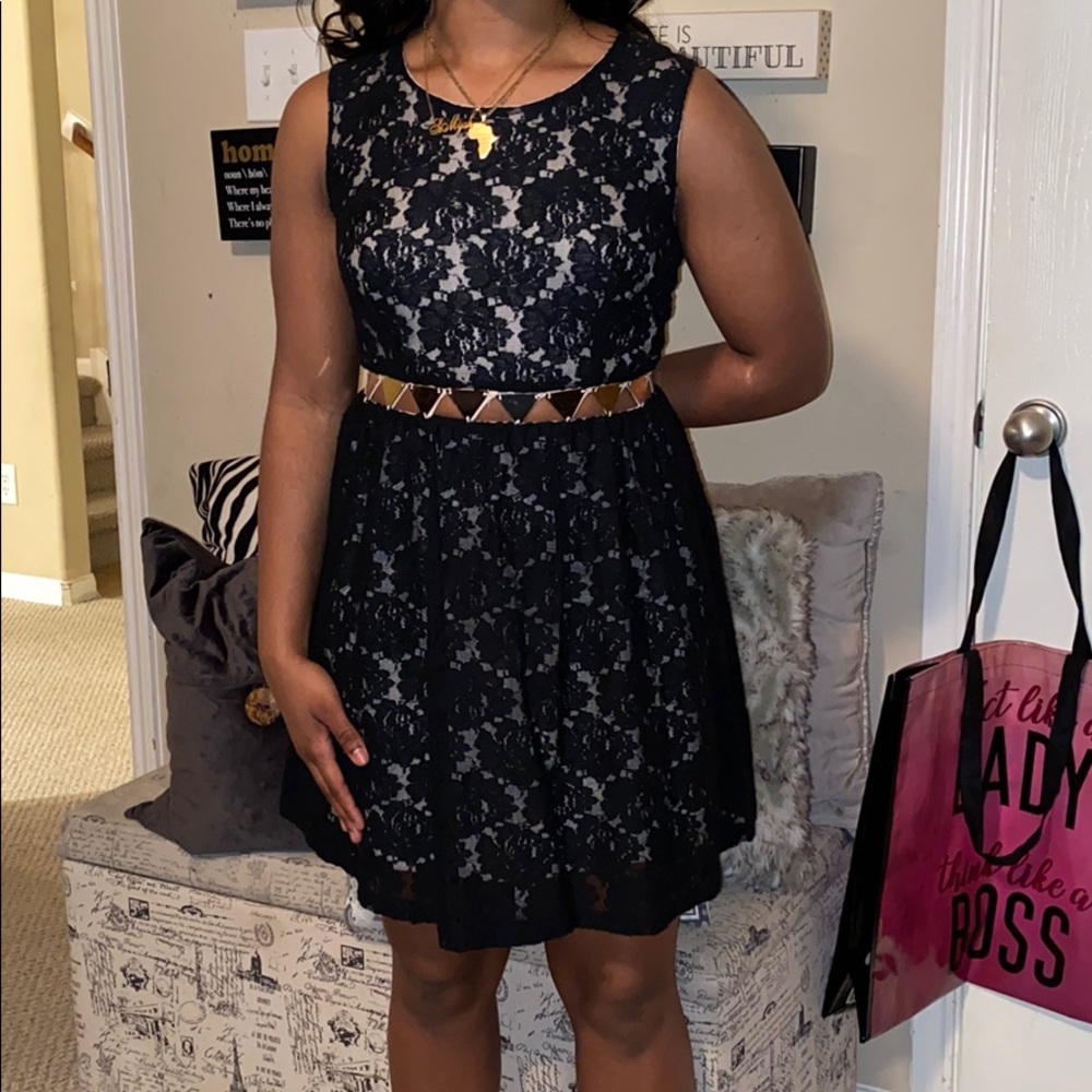 Boutique Uses Black lace and gold cut out dress